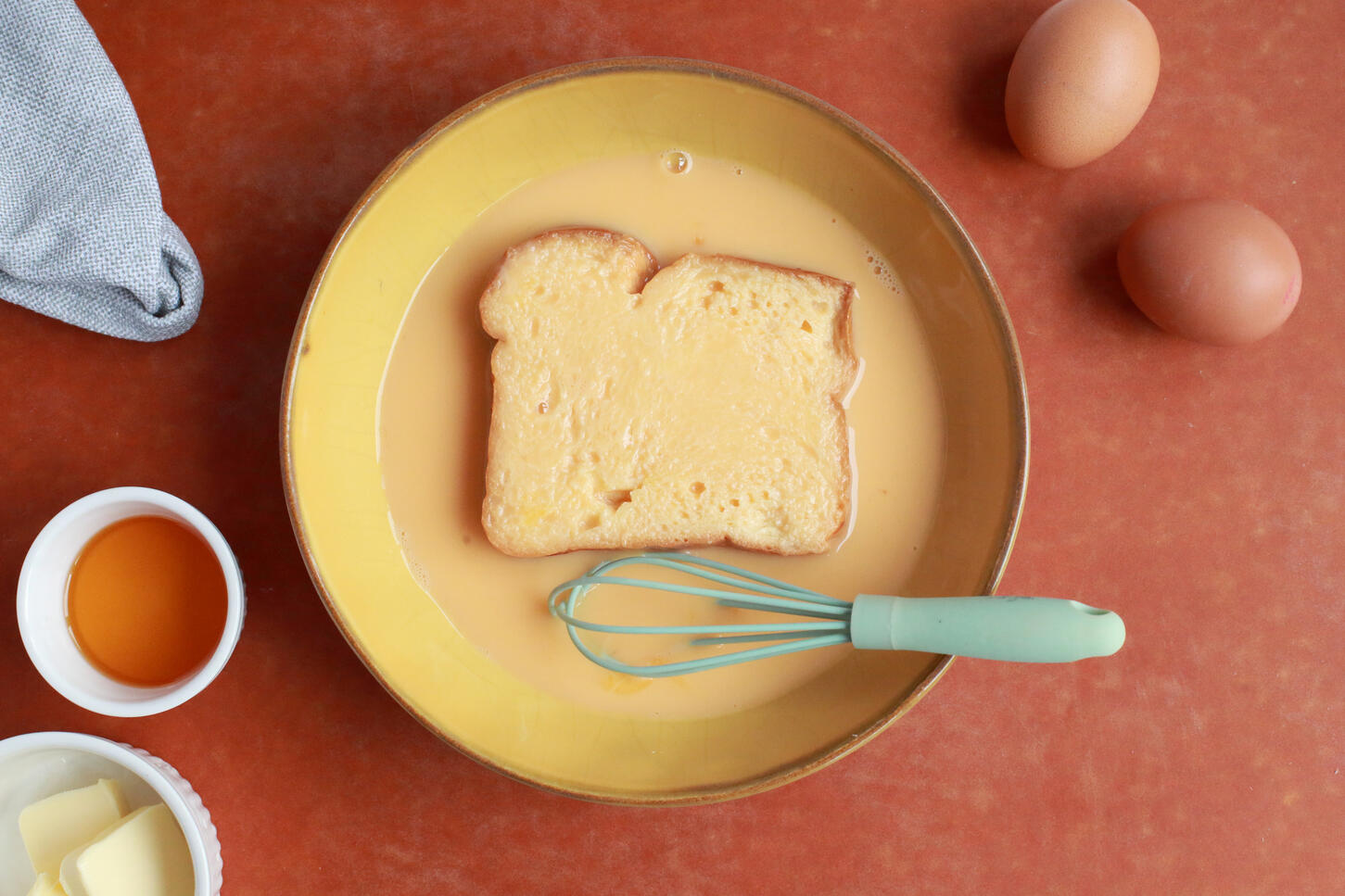 Minimal breakfast toast with egg and coffee styled in warm natural tones
