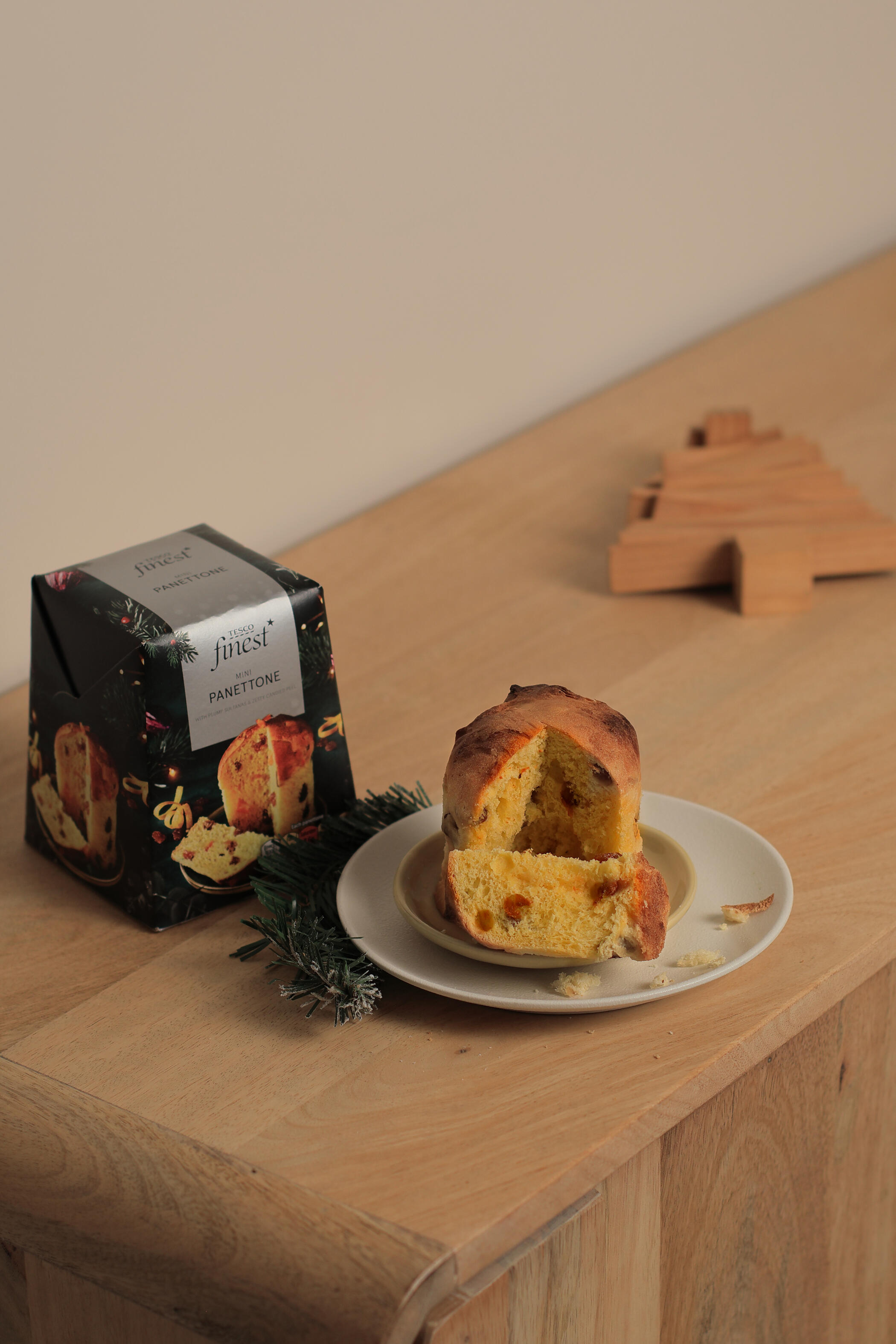 Christmas panettone styling Tesco Christmas panettone styled with minimal Muji holiday decor in soft neutral tones for food photography in Horsham serving London and the South East