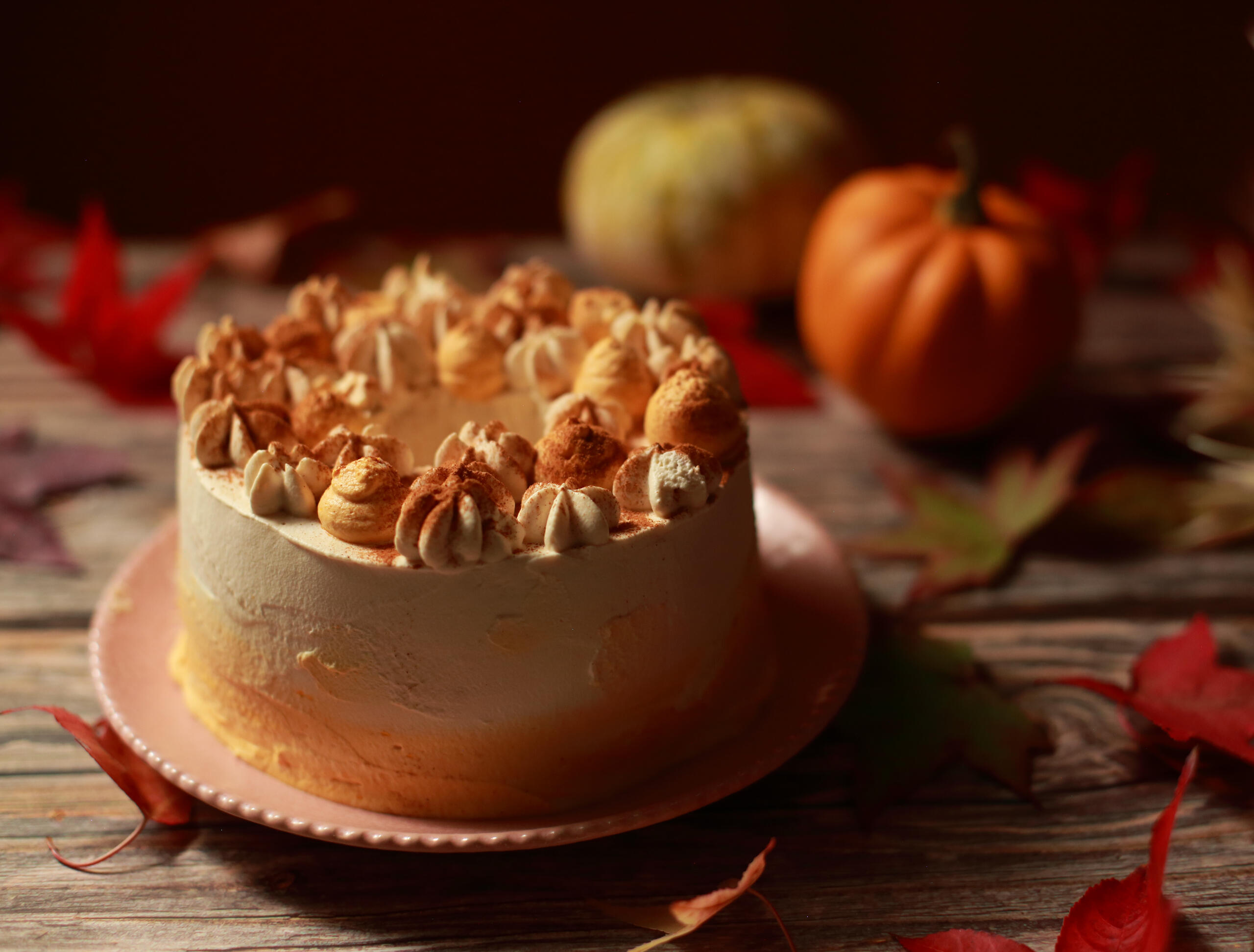 UK South East food photography - Halloween celebration pumpkin spiced sponge cake in orange dark theme UK South East food photography - Halloween celebration pumpkin spiced sponge cake in orange dark theme